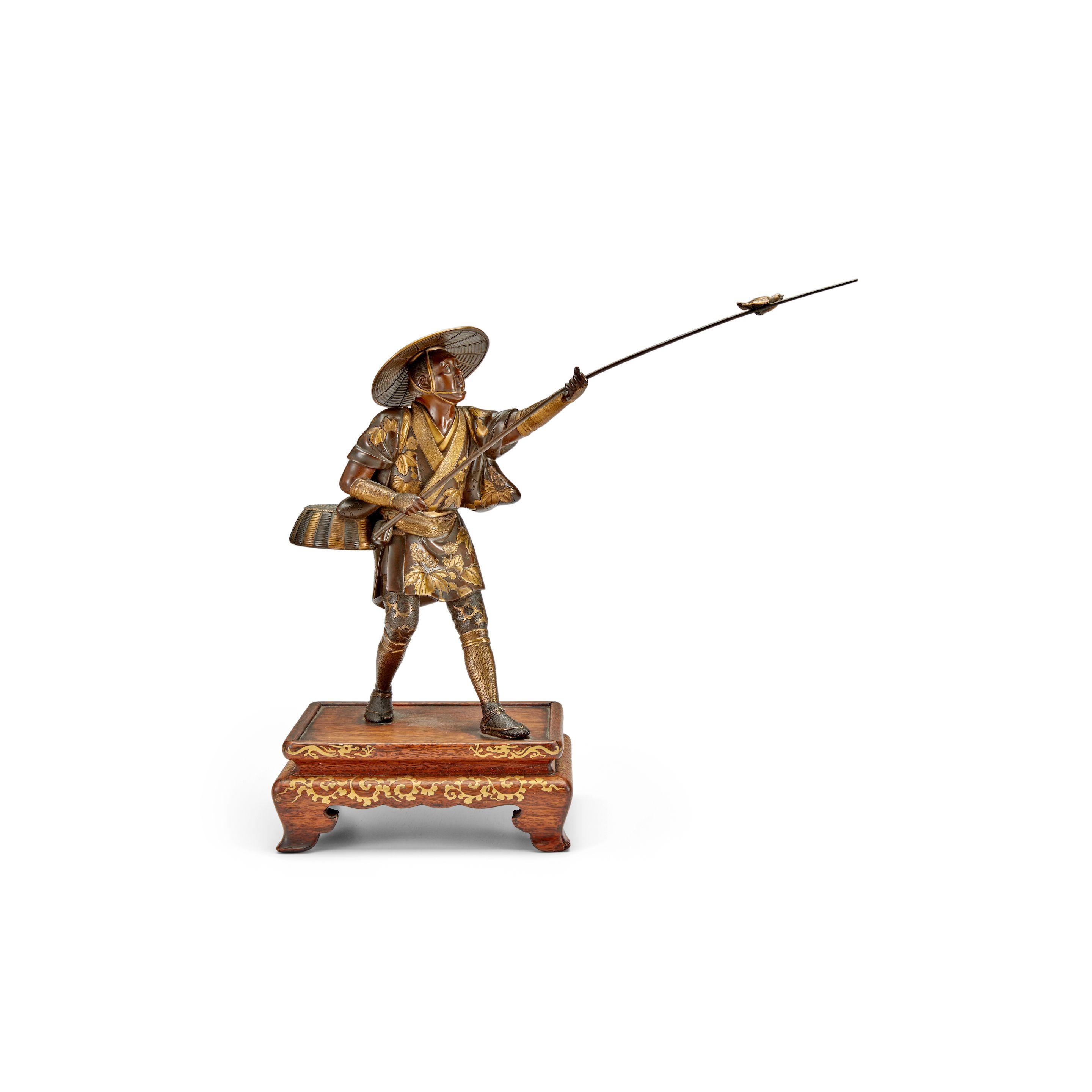 A Bronze Model Of A Bird Catcher