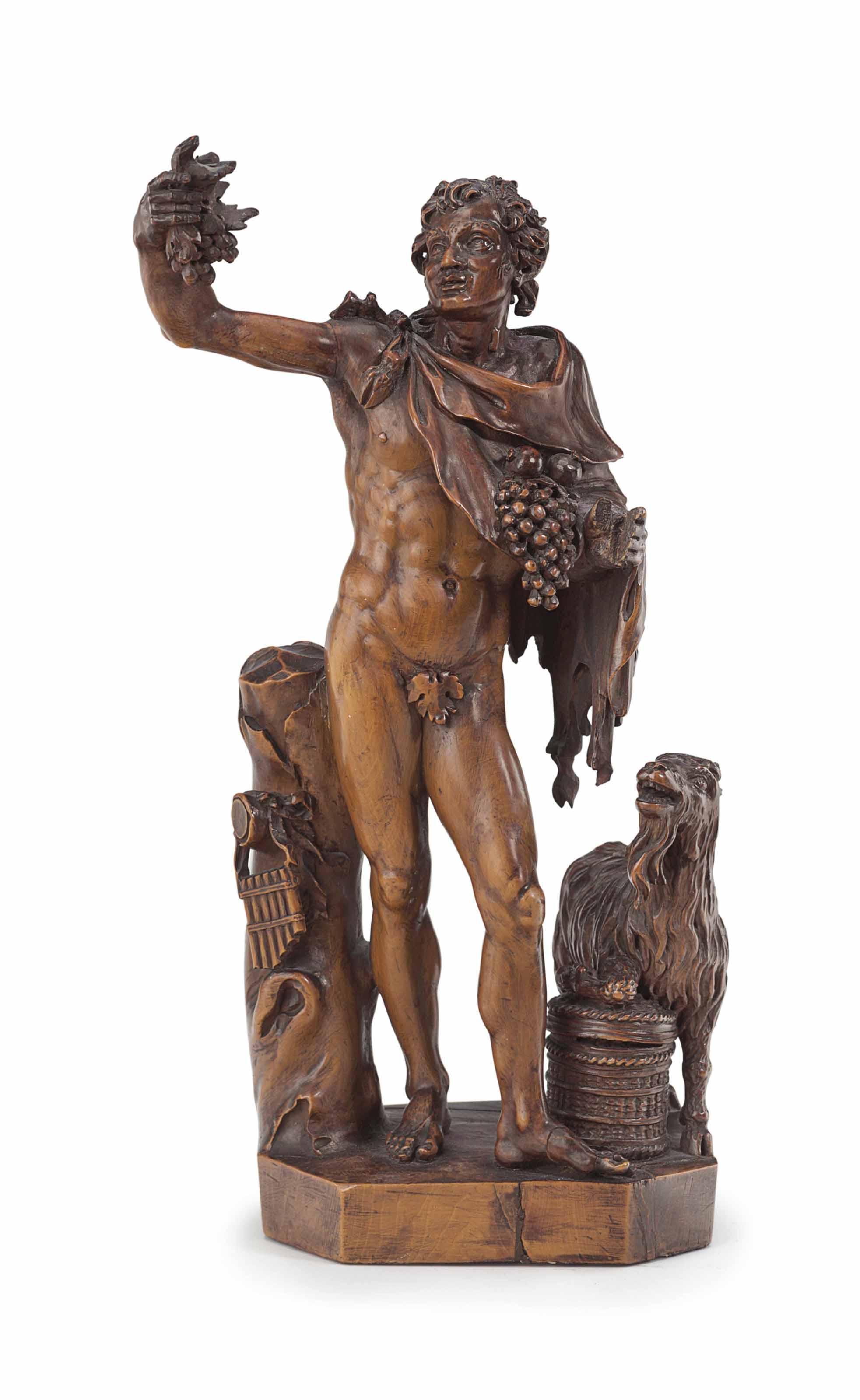 A Carved Boxwood Group Of A Satyr With A Goat