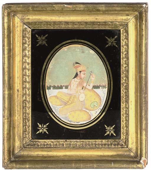 A Miniature Painting Of A Female Musician