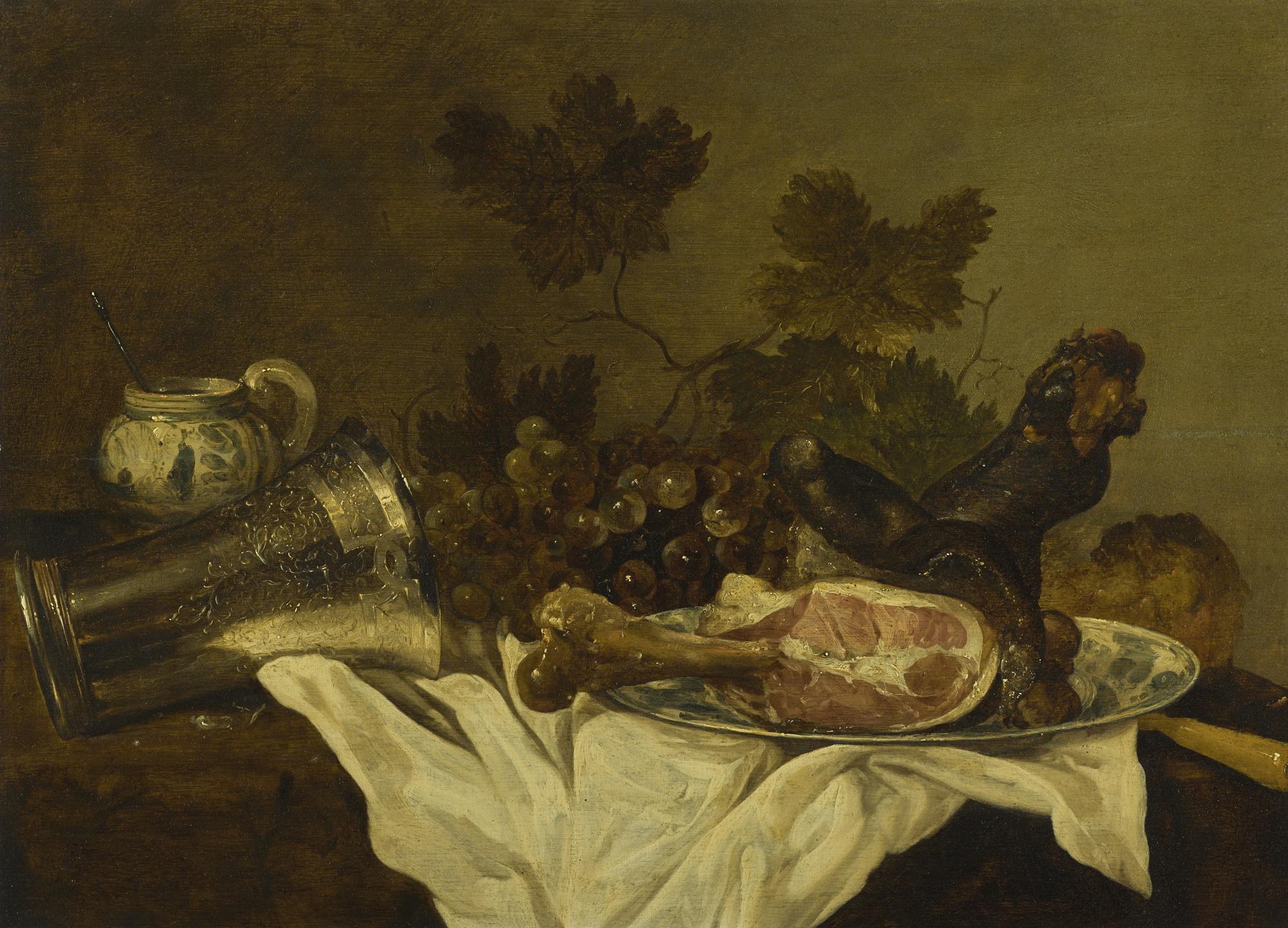 Abraham Susenier - Still Life With A Ham On A Wan-Li Kraak Dish, A Fallen Silver Beaker, A Mustard Jar And Grapes, All On A Table Draped With A White Cloth
