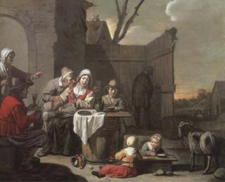 Abraham Willemsens - The courtyard of a country inn with peasants eating and drinking