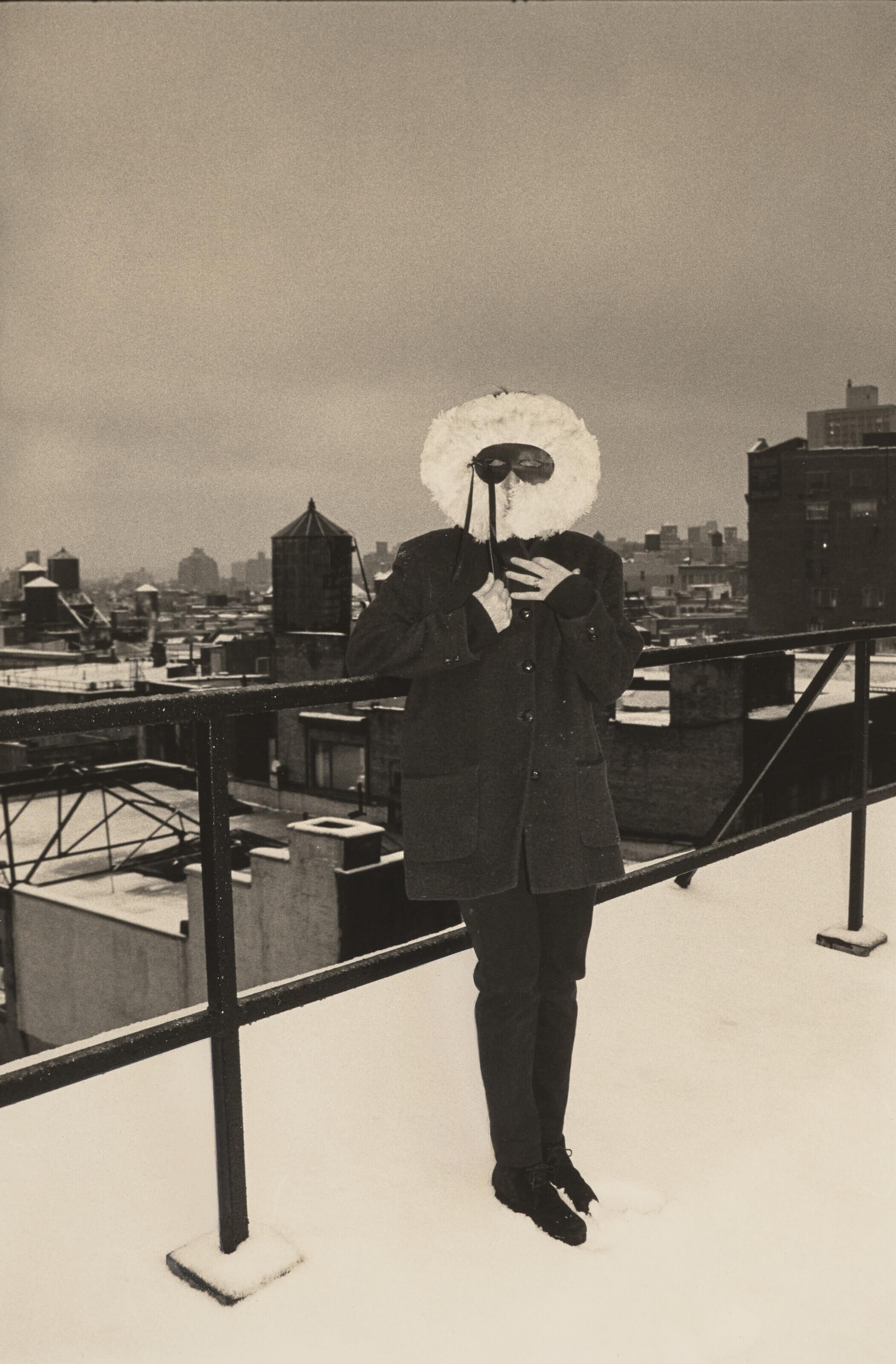 Albert Watson - Cindy Sherman wearing a mask on the roof of her home, New York, 1994