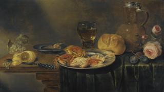Alexander Adriaenssen - A Still Life With Roses, A Jug, A Loaf Of Bread, A Filled Wine Glass, Two Plates With Prawns And Crabs, A Knife, A Partly-Peeled Lemon And Grapes Over A Prtly-Draped Table