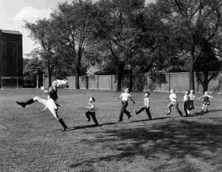 Alfred Eisenstaedt - A Drum Major and His Protègés Practising in Ann Arbor, Michigan (1950)