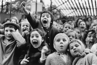 Alfred Eisenstaedt - Expression of Children at the Puppet Theater, Tuileries, Paris