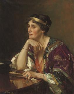 Alfred Priest - Portrait of Mrs Radcliffe, seated half-length, at a table in an oriental gown