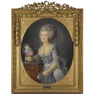 Anne Vallayer-Coster - Portrait Of Madame Adélaide Auguie, Three Quarter Length, Standing Beside A Table Holding A Vase Of Flowers