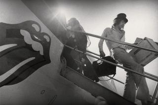 Annie Leibovitz - Mick Jagger disembarking from plane, c. 1972
