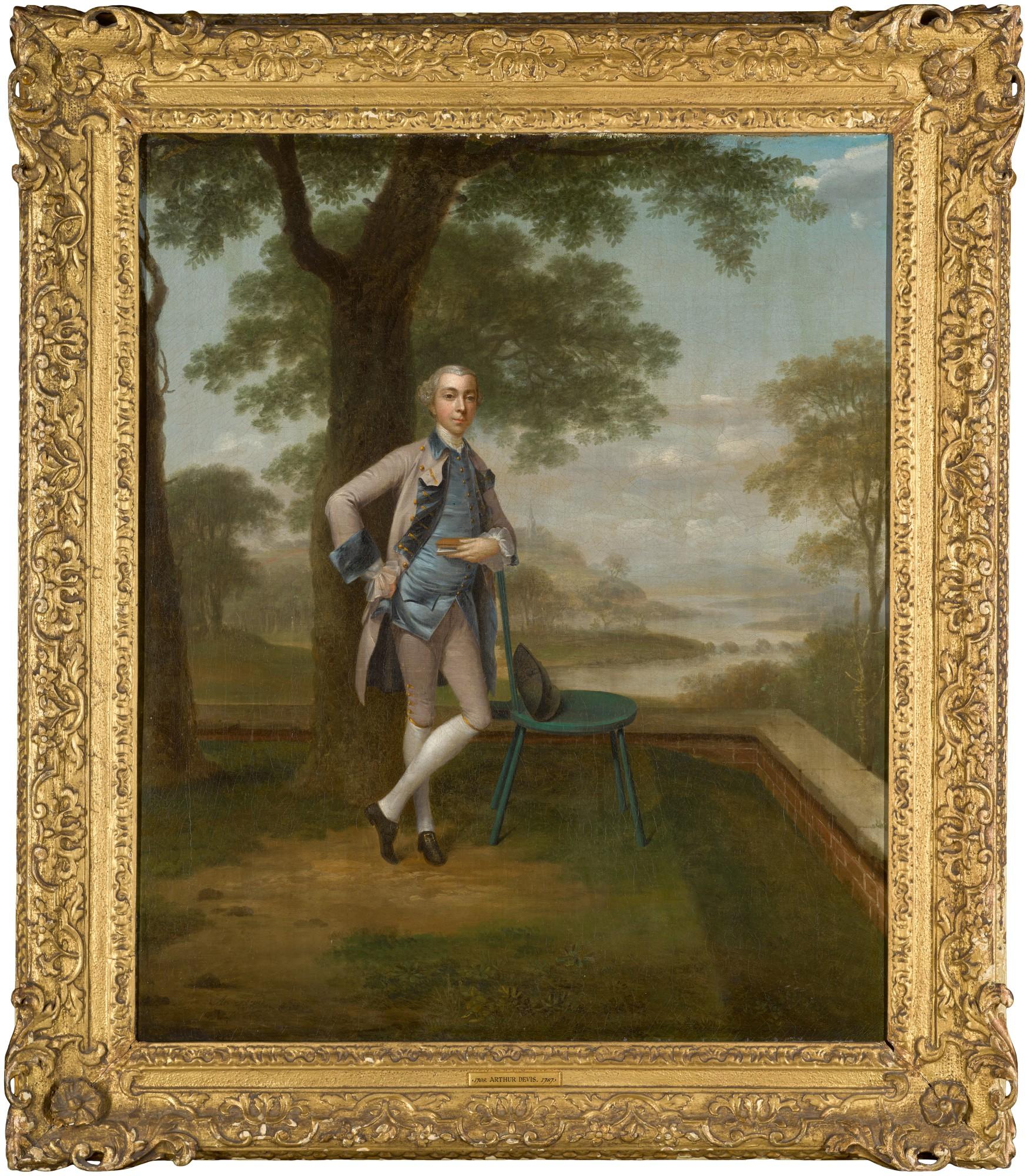 Arthur Devis - Portrait of a gentleman, full-length, standing on a terrace, wearing a grey suit and blue waistcoat, a river landscape beyond