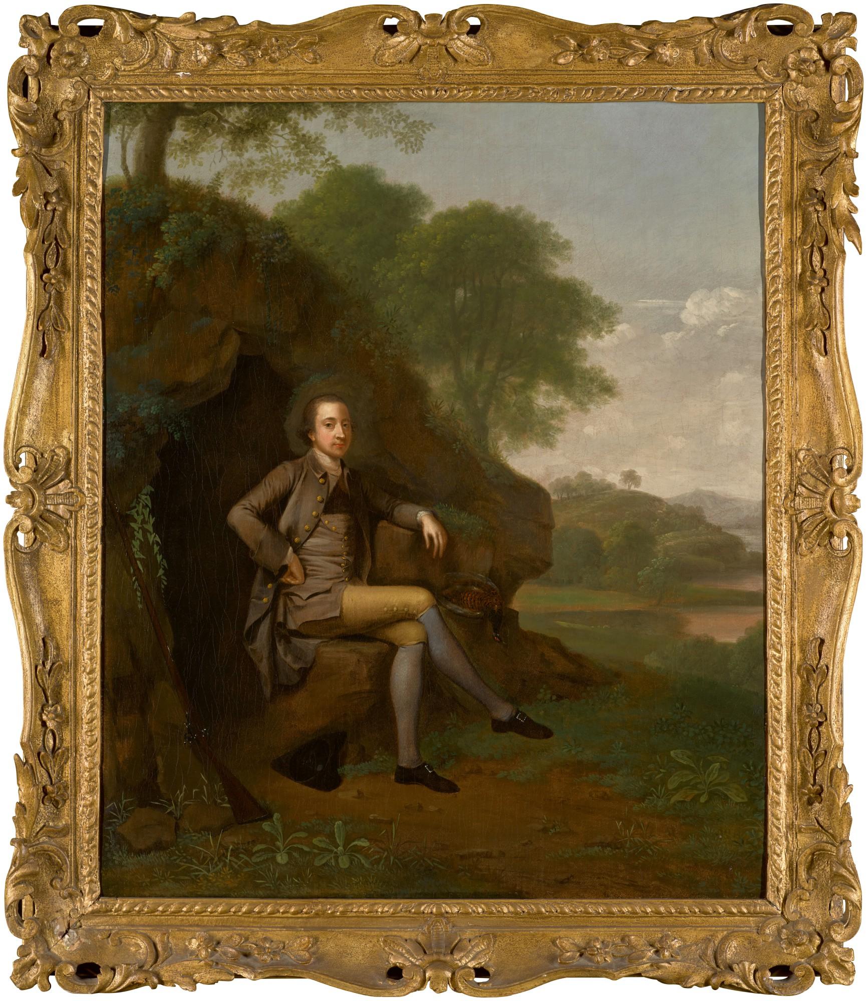 Arthur Devis - Portrait of a gentleman, possibly the Reverend William of Digby, of Landenstown, Country Kildare, full-length, seated beneath a tree, a gun and pheasant by his side