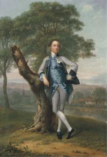 Arthur Devis - Portrait of Thomas Bateman Lane (b. 1735), small full-length, in a grey suit with a blue waistcoat, holding a tricorn in his left hand, leaning on a tree stump, in a river landscape with the sea beyond