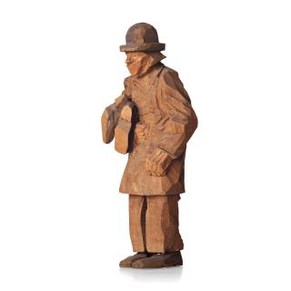 Axel Petersson Döderhultarn - Man holding boots