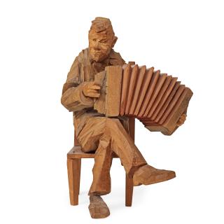 Axel Petersson Döderhultarn - Seated accordionist