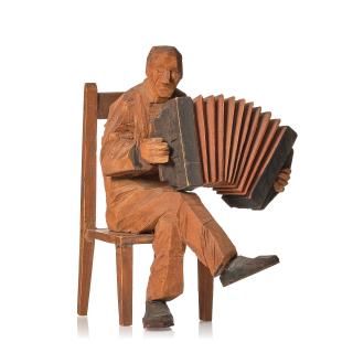 Axel Petersson Döderhultarn - Seated accordionist