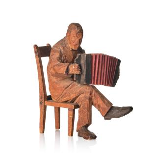 Axel Petersson Döderhultarn - Seated accordionist