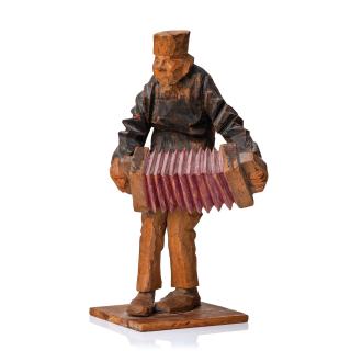 Axel Petersson Döderhultarn - Standing accordionist