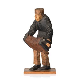 Axel Petersson Döderhultarn - Standing accordionist