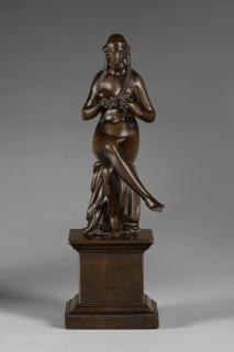 Barthélemy Prieur - A Bronze Figure Of A Seated Nude Woman Braiding Her Hair