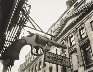 Berenice Abbott - Gunsmith and Police Department, 6 Center Market Place, Manhattan, 1937
