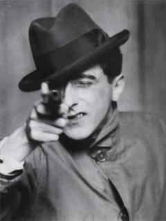 Berenice Abbott - Jean Cocteau with Gun, Paris, 1927