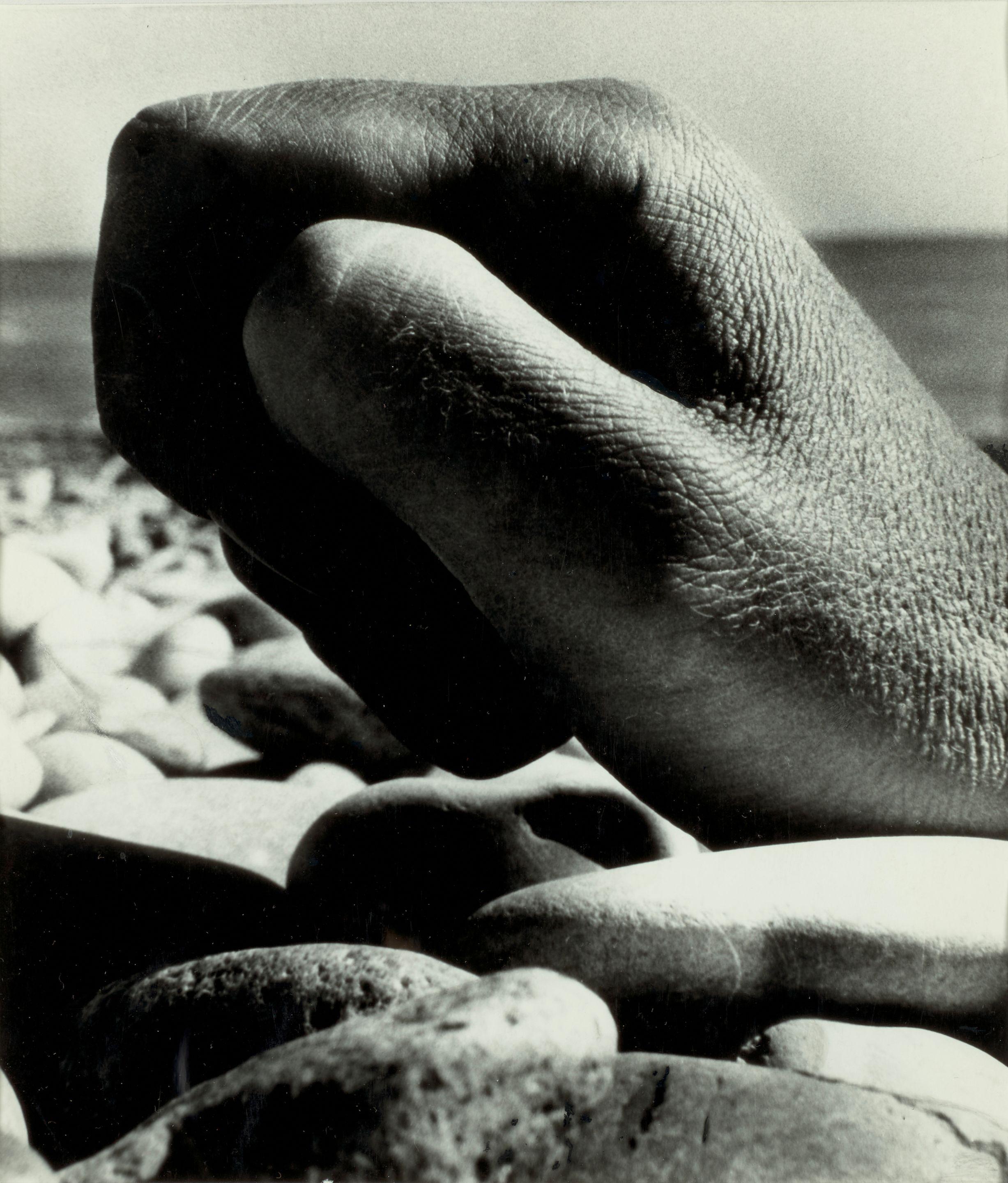 Bill Brandt - Fist on Pebbles