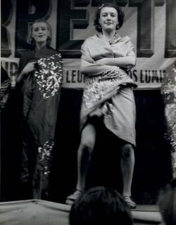 Brassaï - Conchita on Display in Front of the Booth, c. 1931