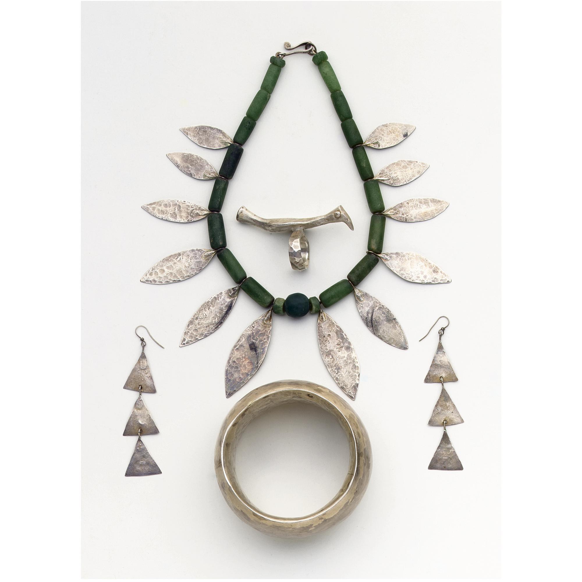 Breon O\'Casey - A Collection Of Jewellery Including A Jadite And White Metal Necklace Together With A Pair Of Earrings, A Ring And A Bangle