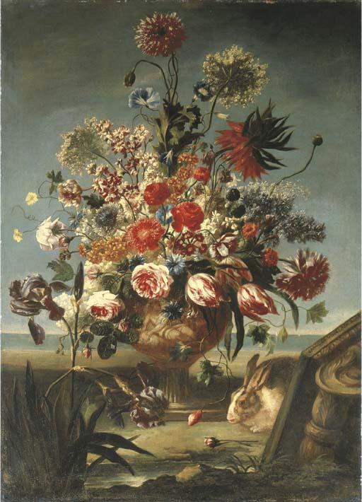 Carel Van Vogelae - Parrot tulips, roses, an imperial lily, morning glory and other flowers in a sculpted vase with a rabbit, by an upturned capital in a landscape