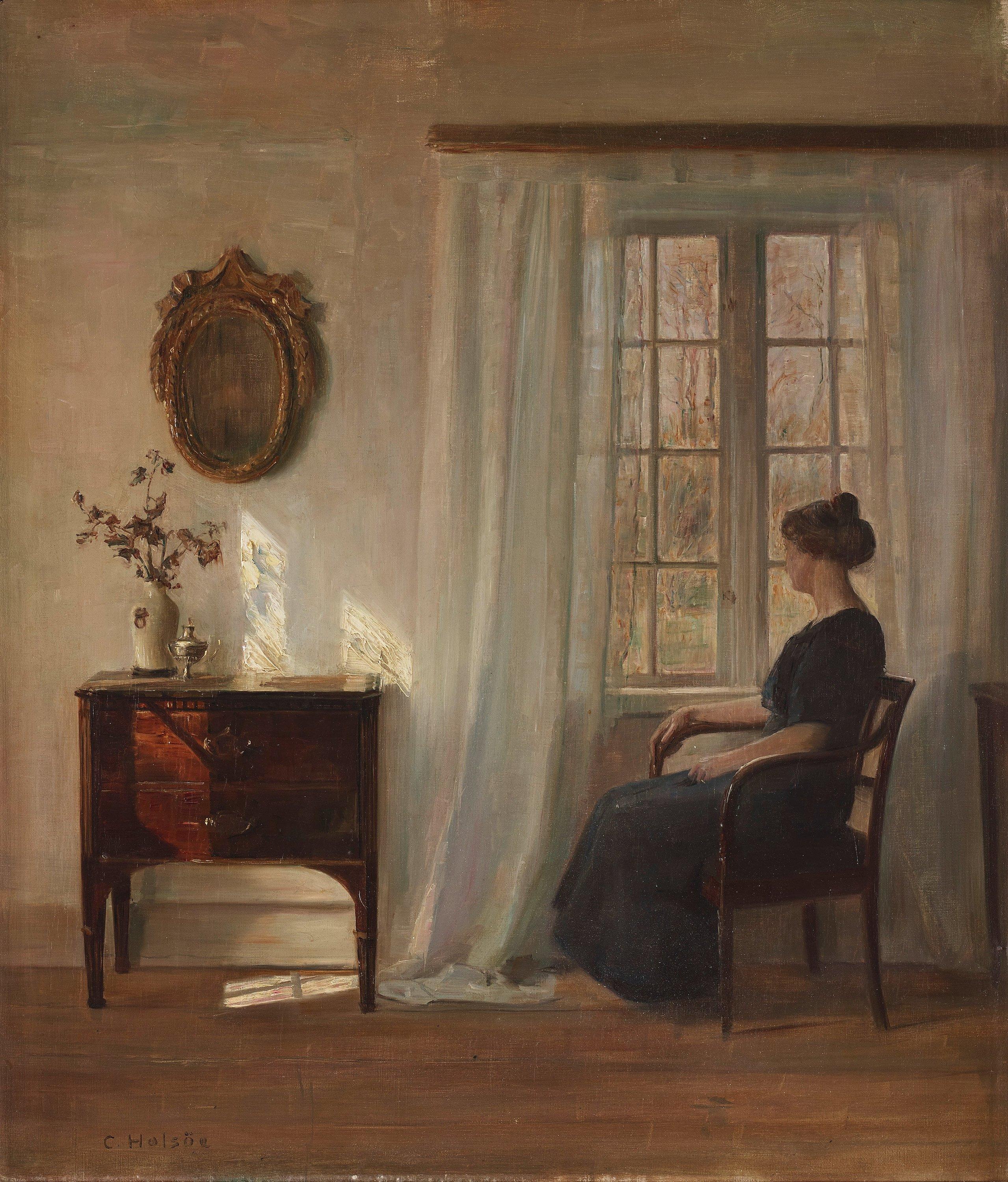 Carl Holsoe - Interior with seated woman by the window