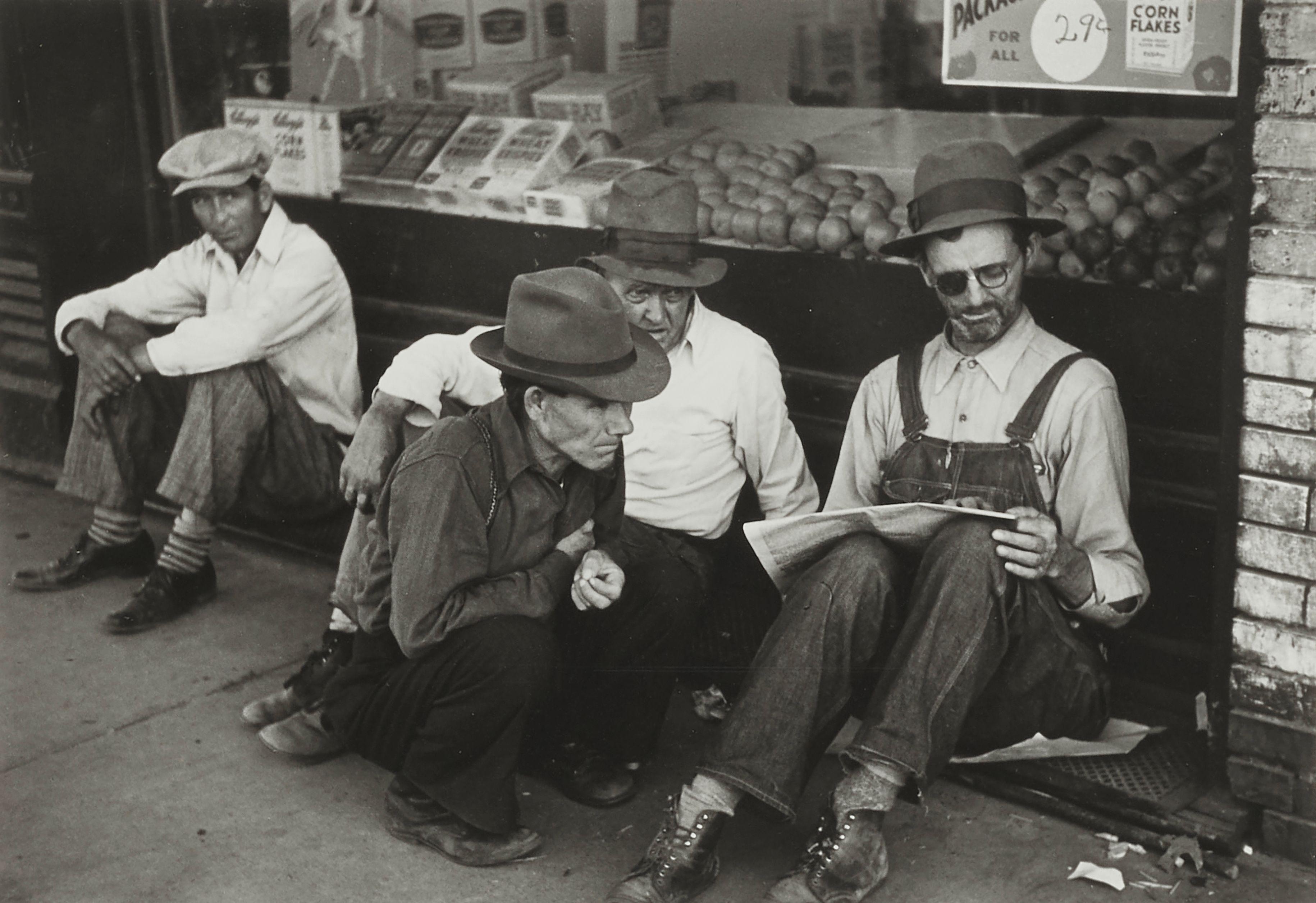 Carl Mydans - Sharing the morning news, Farmer Group, Prairie County, Mississippi County, Missouri