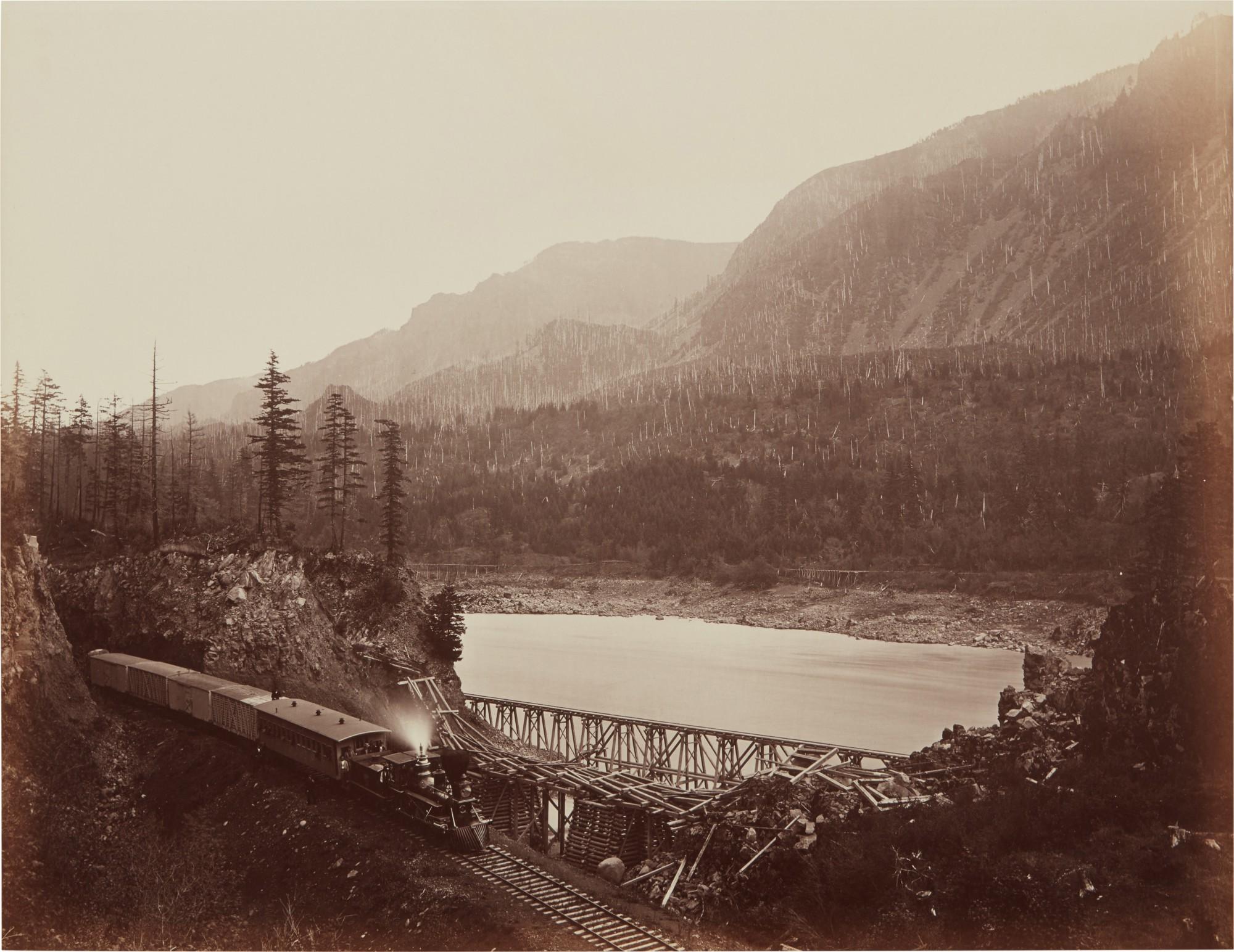 Carleton E. Watkins - \'Ruins of the High Bridge, Cascades\' (Middle Block House, Columbia River, Washington Territory)
