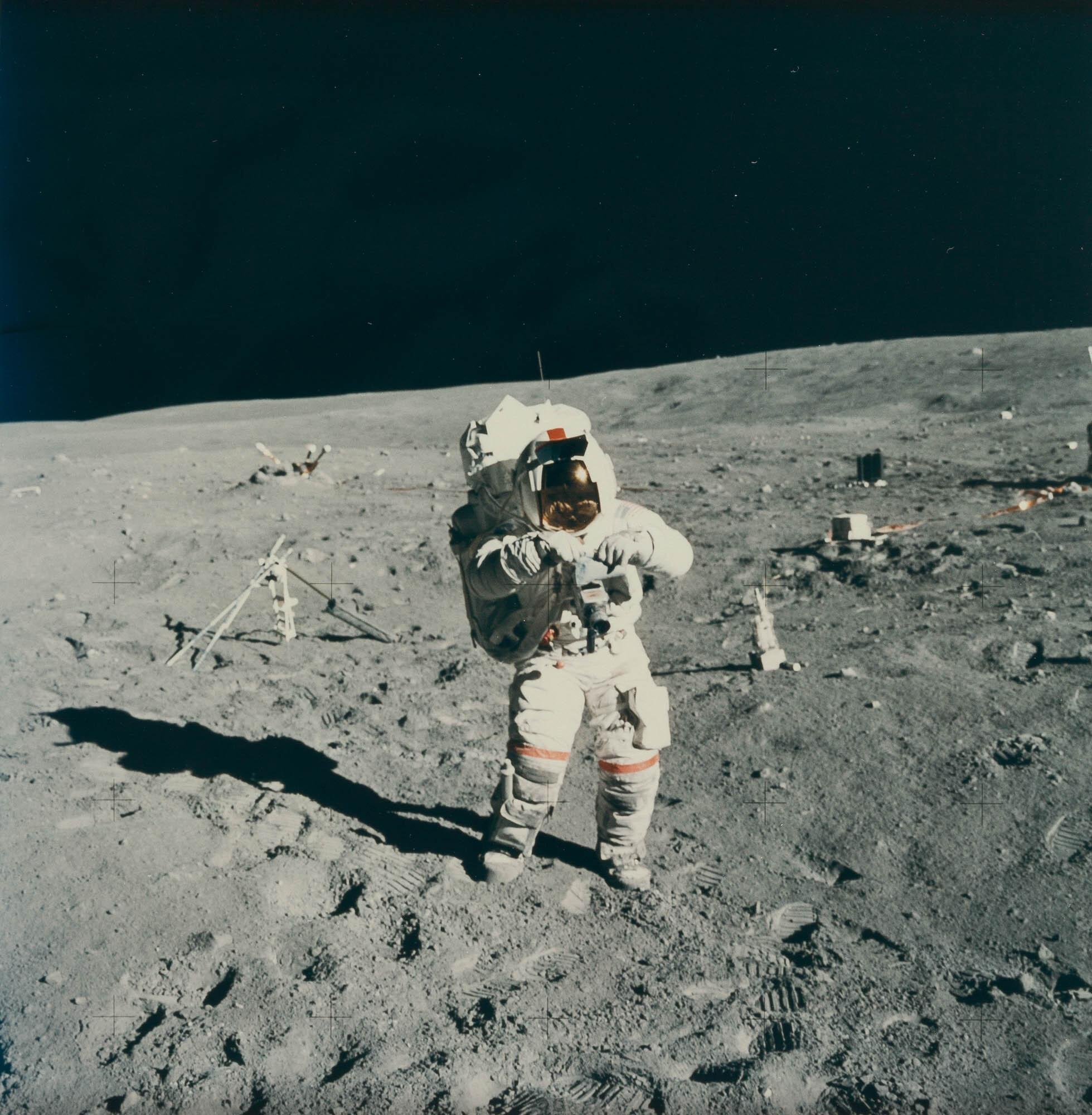 Charles Moss Duke - Apollo 16: John W. Young at the ALSEP deployment site.