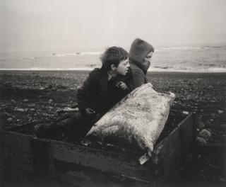 Chris Killip - Rocker And Rosie Going Home, Seacoal Beach, Lynemouth, Northumberland, Uk, 1984
