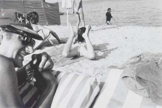 Chris Von Wangenheim - Helmut Newton Photographing on the Beach, St. Tropez, 1970s