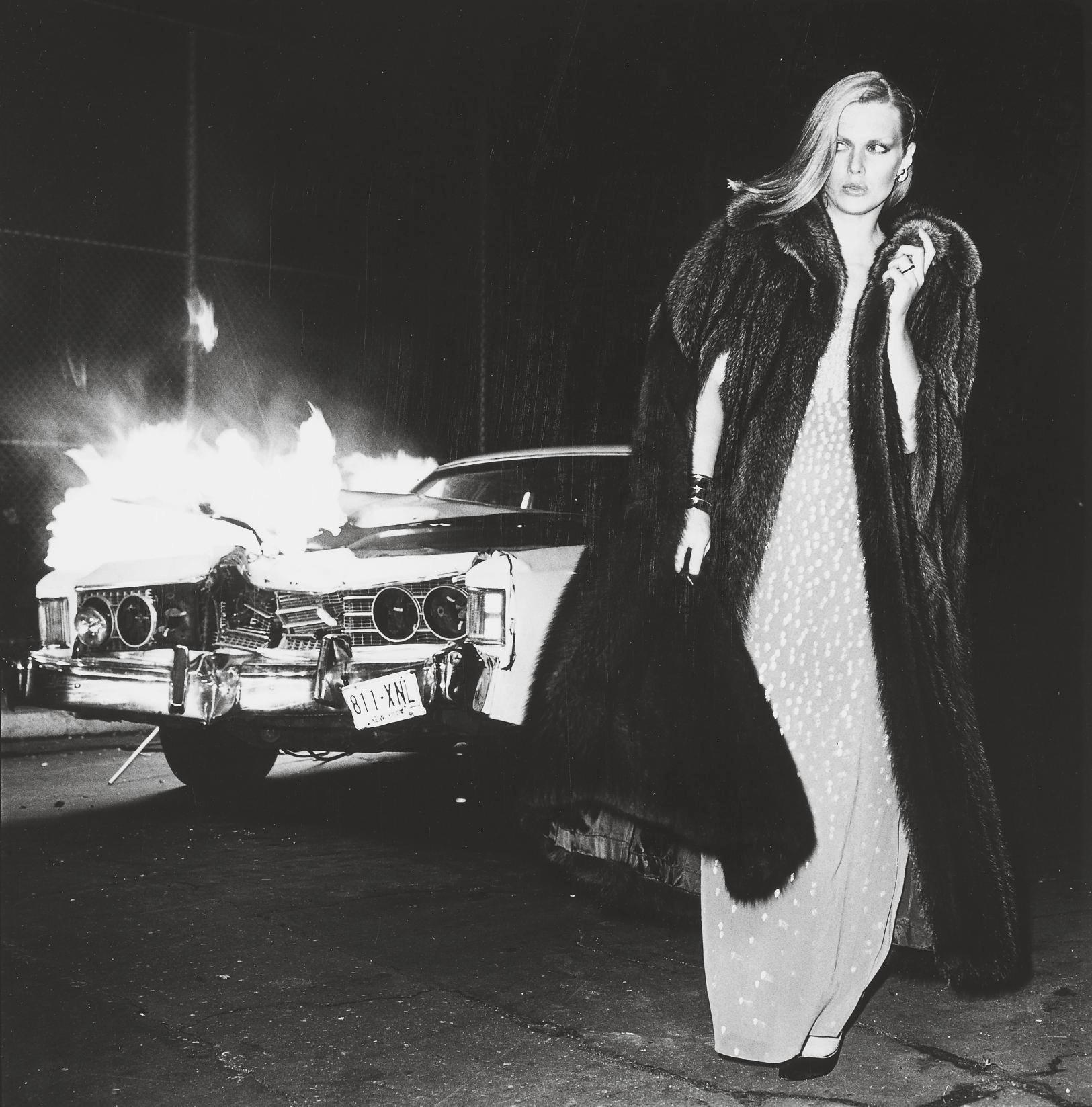 Chris Von Wangenheim - Woman in Fur Coat by Burning Car, for Christian Dior, 1970s