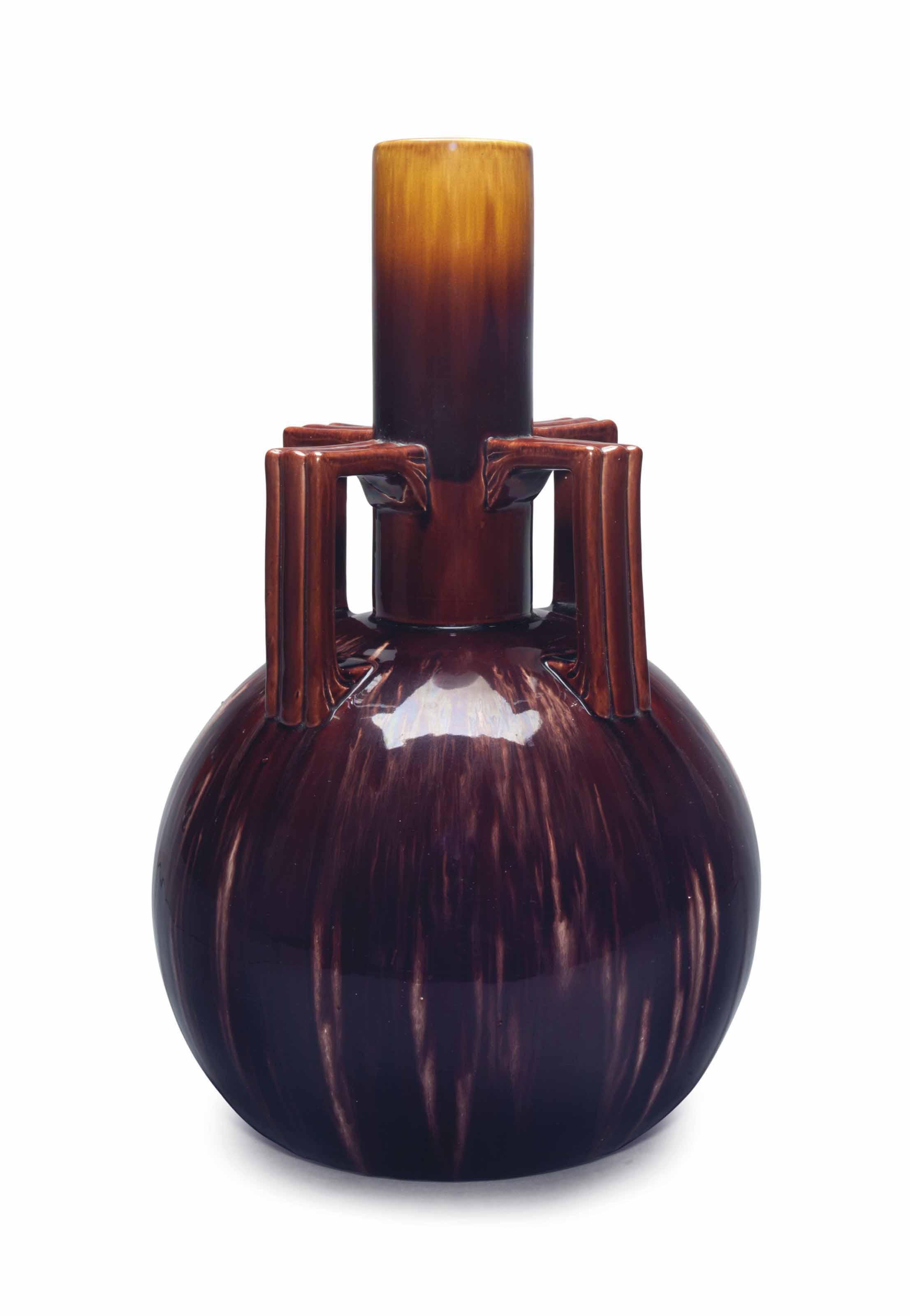 Christopher Dresser - A LARGE FOUR-HANDLED VASE, CIRCA 1895