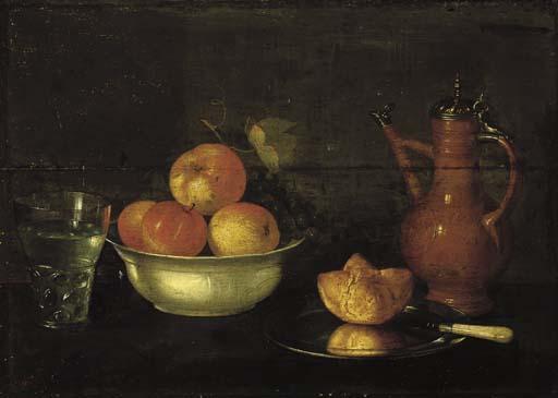 Cornelis Jacobsz. Delff - Apples and grapes in a porcelain bowl, a bread roll on a pewter plate, a glass of water and a jug on a wooden ledge.