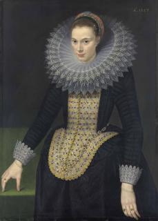Cornelis van der Voort - Portrait of a lady, three-quarter-length, in a black vlieger brocade gown, with an elongated embroidered stomacher, lace-trimmed cuffs and a cartwheel ruff trimmed with reticella lace