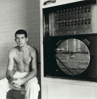 Danny Lyon - Young Convict About to Discharge a Ten-Year Sentence. Apparatus to Open Cells, Ramsey, Texas (From \