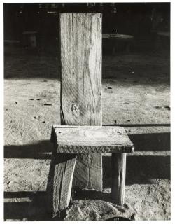 David Goldblatt - A barber\'s chair of mining timbers, outside a compound on the Luipaardsvlei Estates, Krugersdorp, 1965