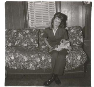Diane Arbus - A Woman with her baby monkey, N.J., 1971