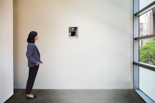 Diane Arbus - Girl with a Cigar in Washington Square Park, N. Y. C.