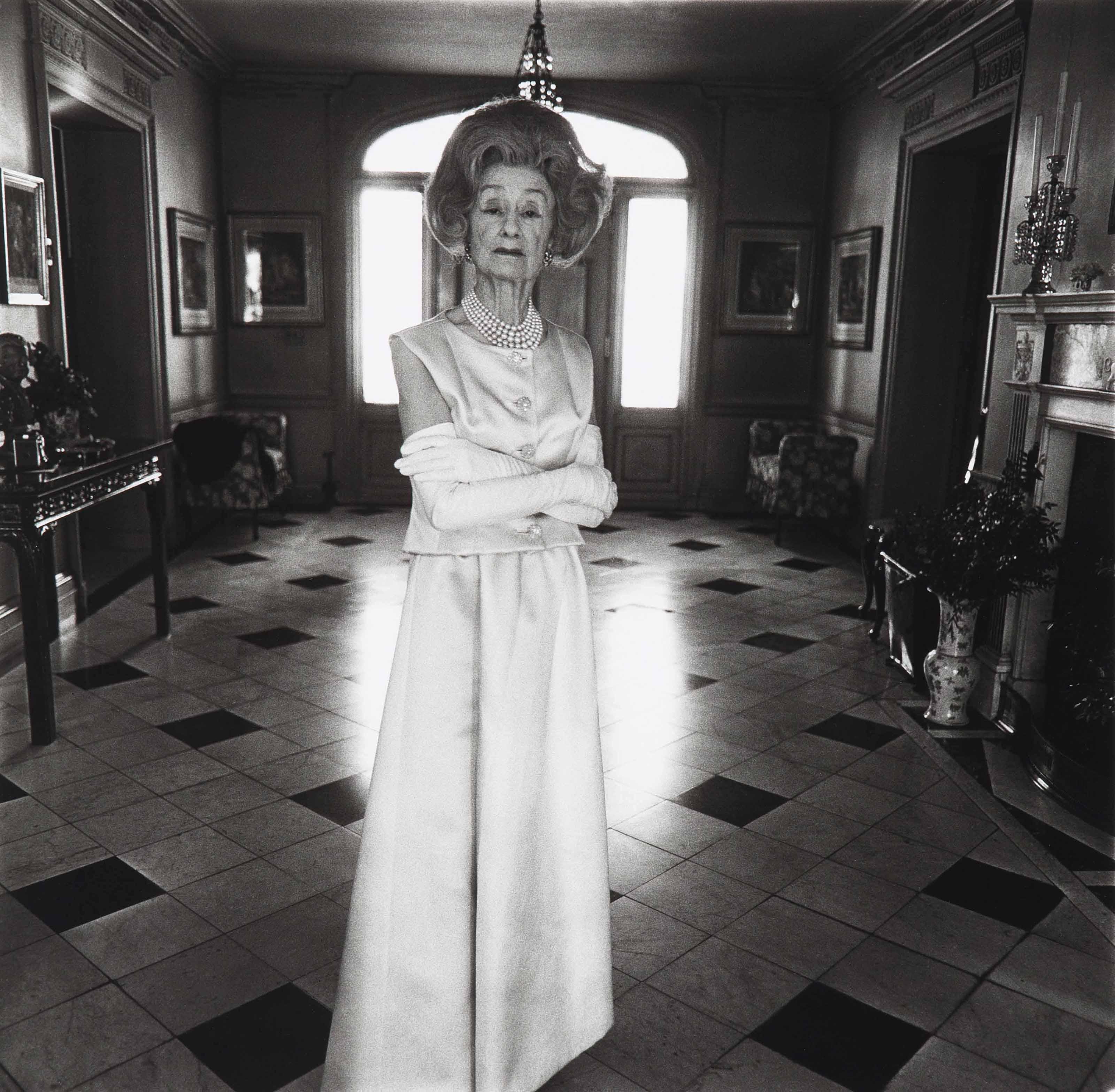 Diane Arbus - Mrs. T. Charlton Henry in an evening gown, Philadelphia, PA., 1965