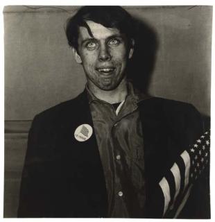 Diane Arbus - Patriotic Young Man with a Flag, N.Y.C., 1967