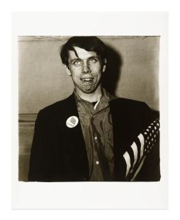 Diane Arbus - Patriotic young man with a flag, N.Y.C.