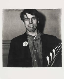 Diane Arbus - Patriotic Young Man With A Flag, N.Y.C.