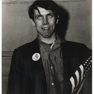 Diane Arbus - Patriotic Young Man With American Flag