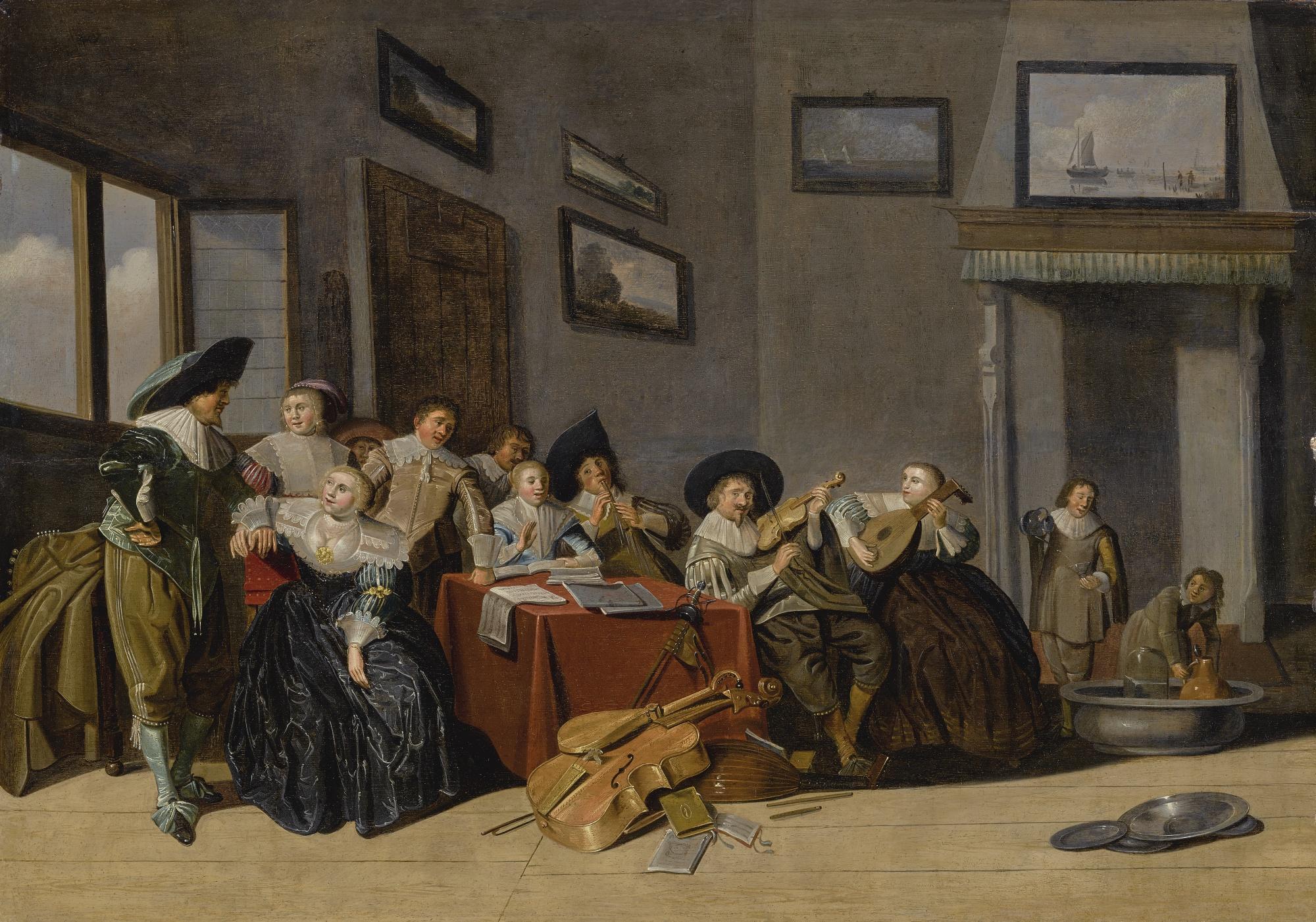 Dirck Hals - An Interior Scene With Cavaliers And A Group Of Ladies Playing Music Around A Table, With Two Figures Preparing To Serve Wine At The Right