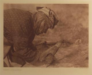 Edward S. Curtis - Fleshing a Hide - Blackfoot