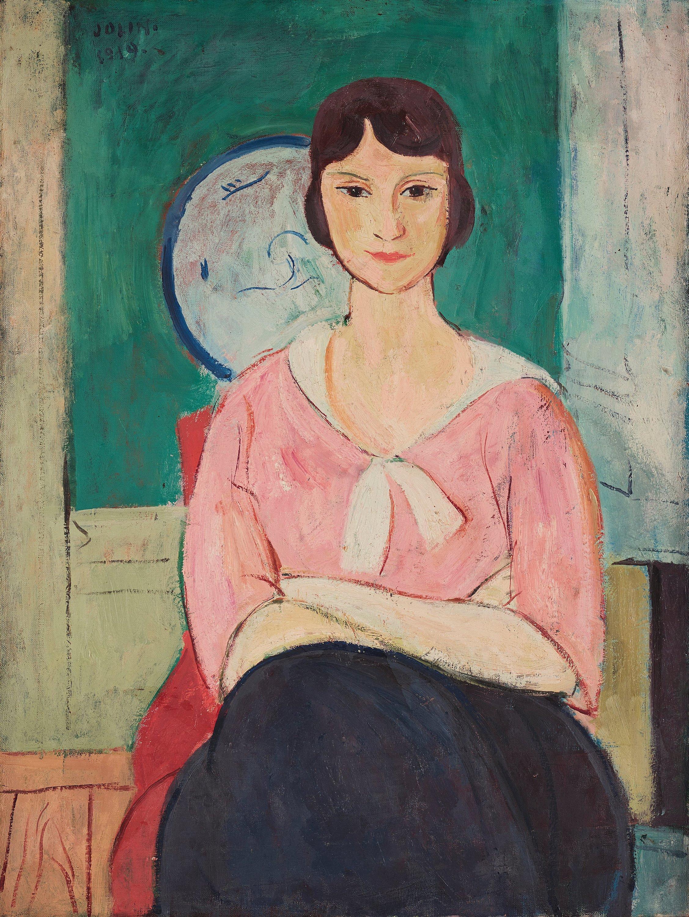 Einar Jolin - Model in a pink blouse.